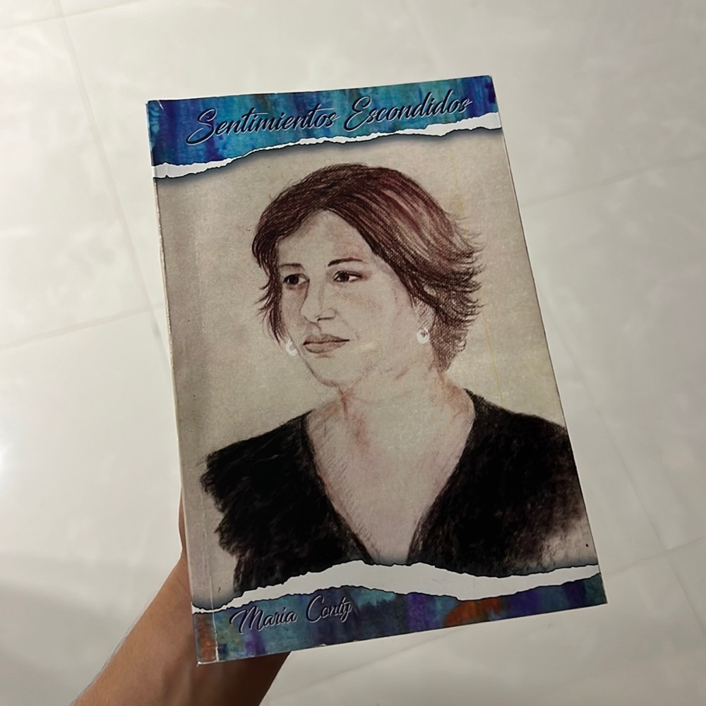 My mom’s book of poems and paintings